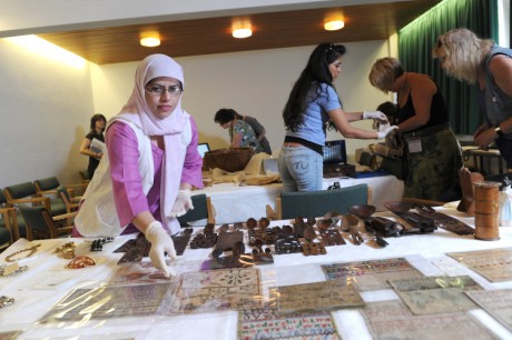 Women looking at artefacts